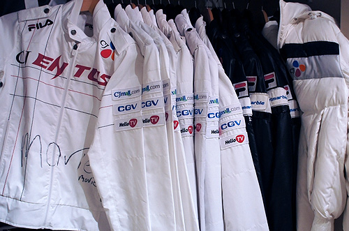 Closet full of CJ Entus Team Uniforms